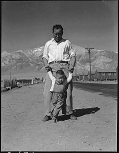 Dorothea Lange- Grandfather with grandson at Manzanar CA Camp